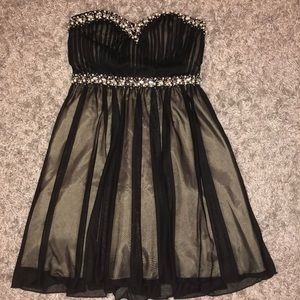 Short black strapless dress